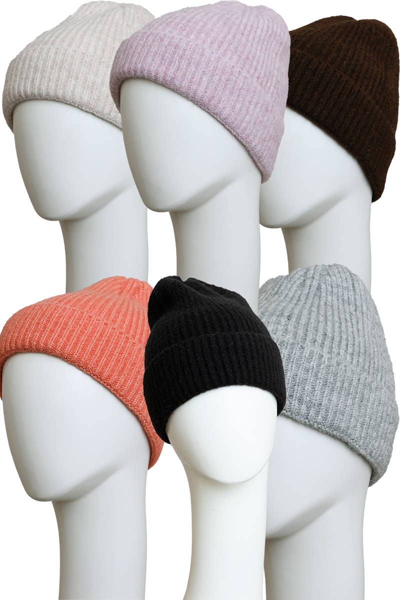 Six white mannequin heads display the Versatile Cuffed Beanie – Cozy Rib Knit Hat by Leto Accessories in cream, light pink, dark brown, coral, black, and light gray—an ideal fall accessory—arranged neatly in two rows against a white background.