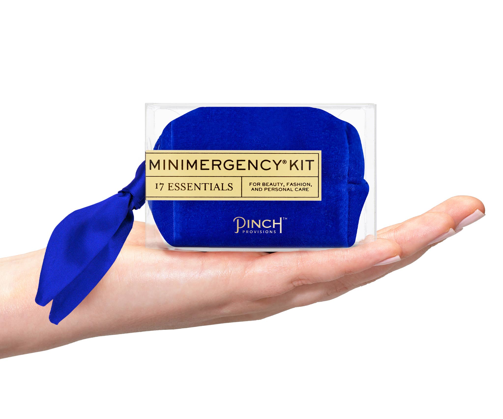Velvet Scarf Minimergency Kit in bright blue with 17 essentials for beauty, fashion, and personal care held in a hand