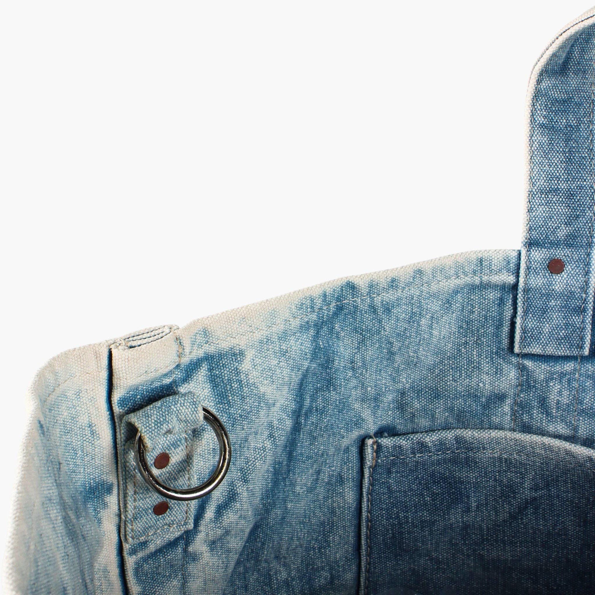 Electrician Tote | Acid Wash close-up showing durable acid wash fabric with metal ring and leather strap details