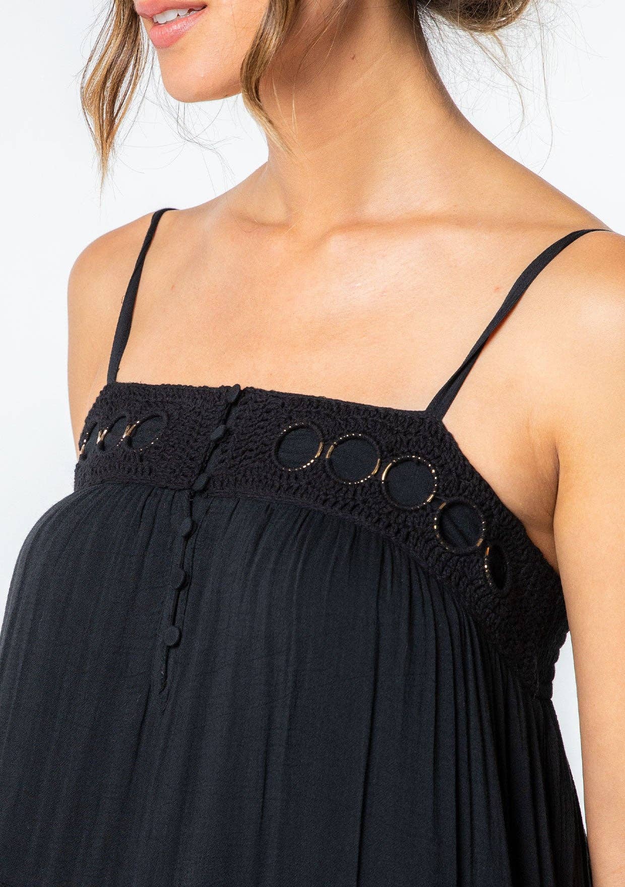 Close-up of black Bohemian Crochet Tiered Maxi Dress with delicate crochet bodice and thin shoulder straps
