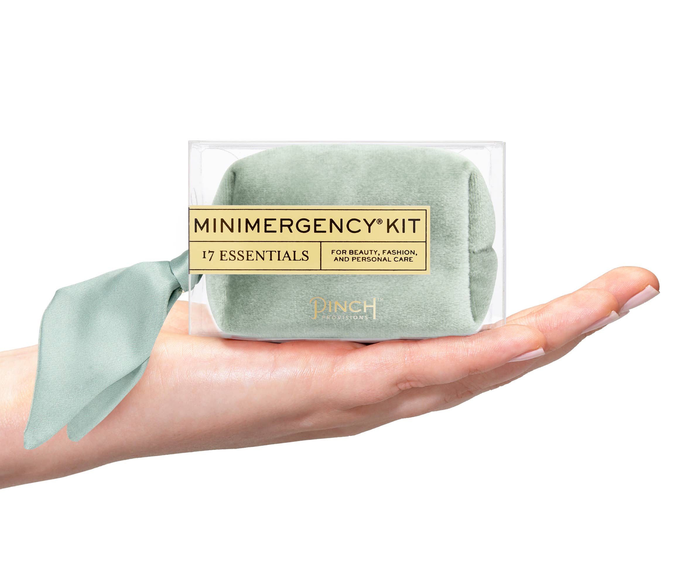 Velvet Scarf Minimergency Kit soft green pouch with 17 essentials for beauty fashion and personal care held in hand