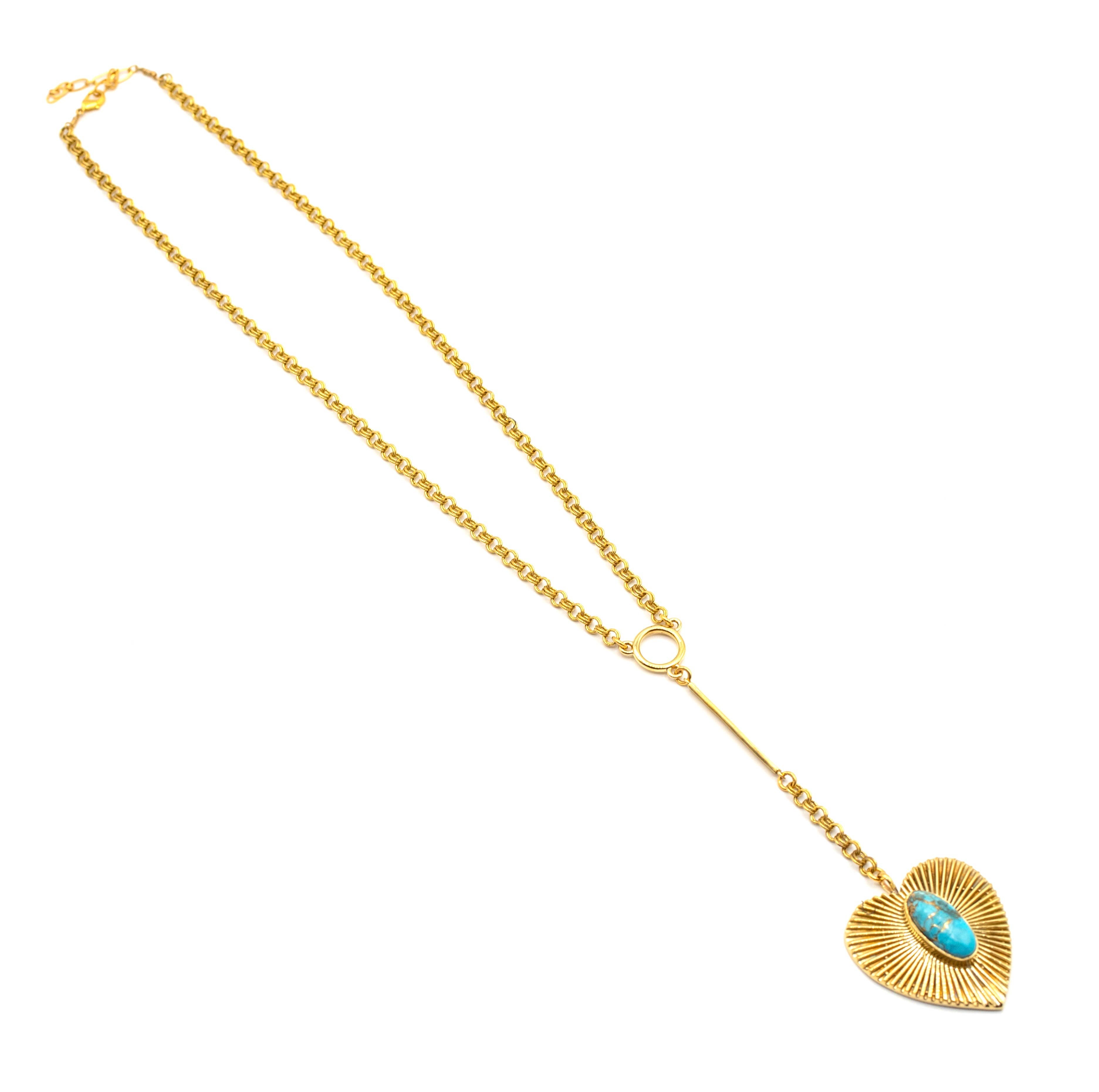 Brass Turquoise Heart Necklace with gold chain and textured heart pendant featuring a bright turquoise stone centerpiece