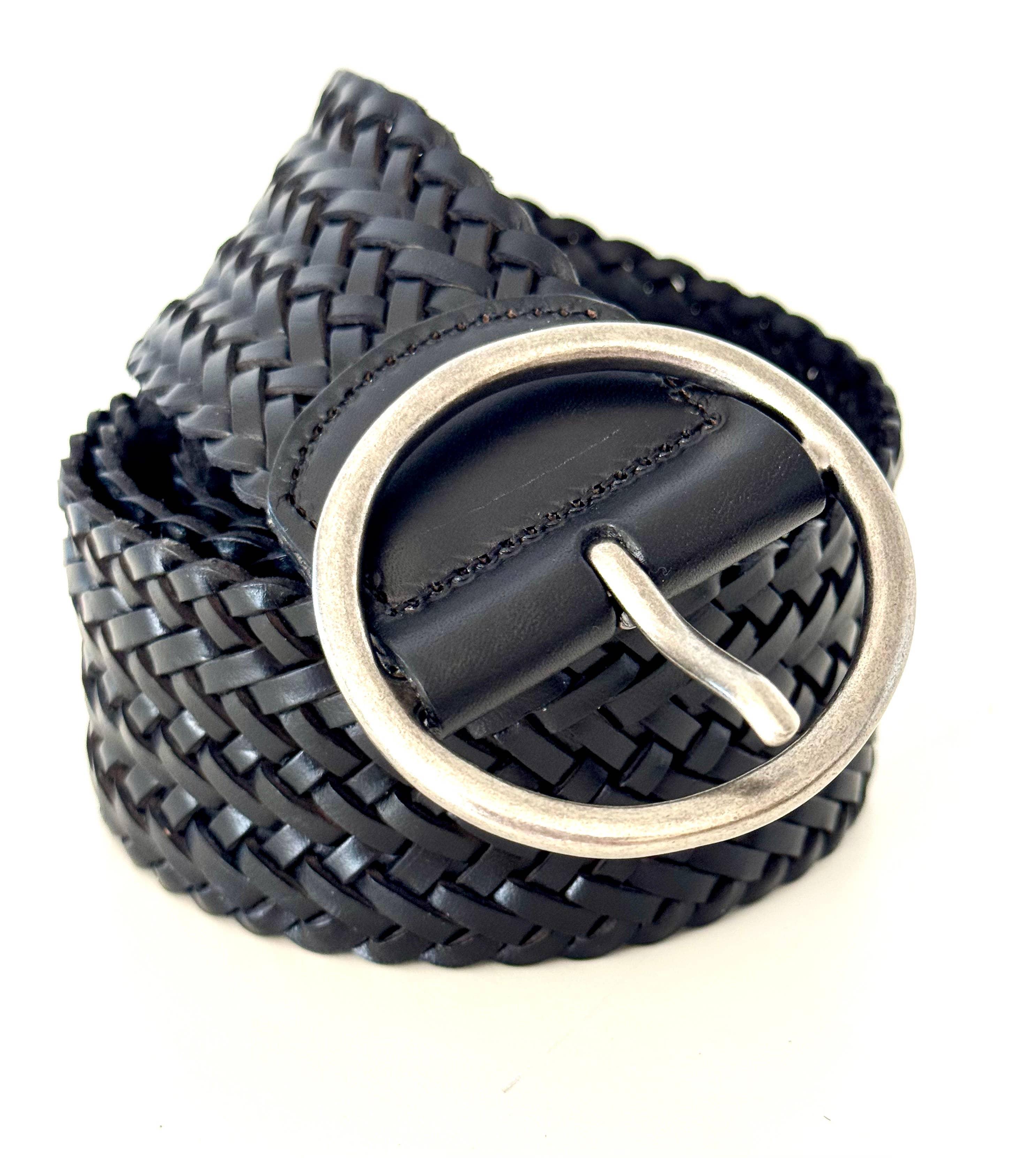 The Ginger Blue Classic Wide Braided Leather Belt in Black features a coiled design with a large vintage silver buckle, shown on a white background.