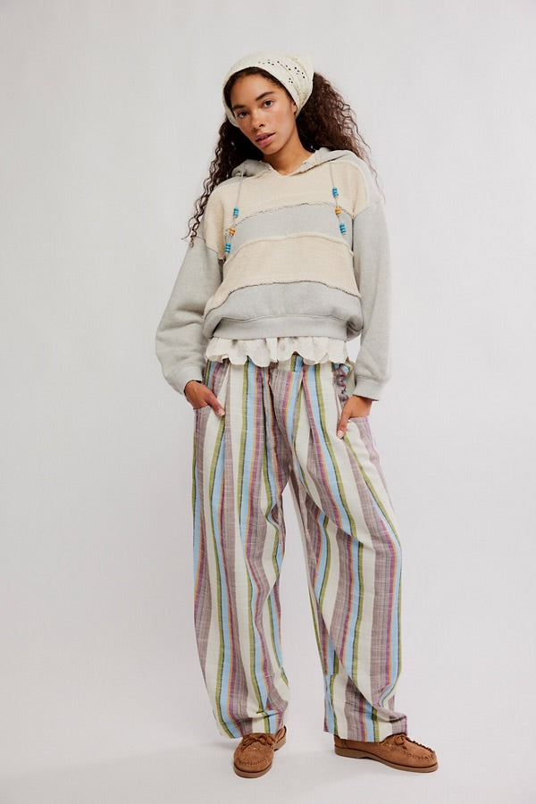 Model wearing Free People Chambers Laid Back Stripe Pull-On Pant with soft striped fabric and relaxed fit style