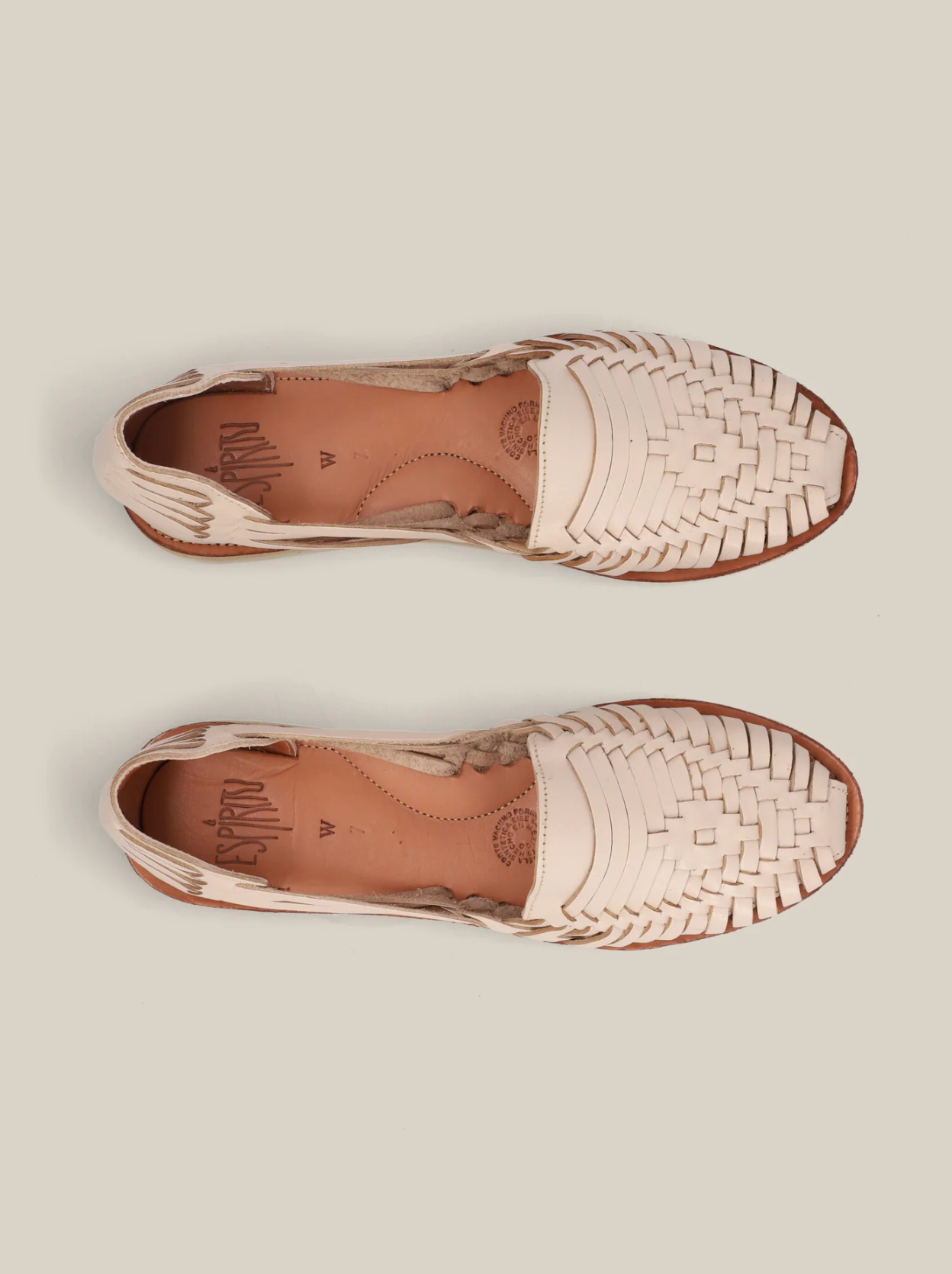 Desierto Classic Huaraches in light tan leather with intricate woven design and closed toe, top view.