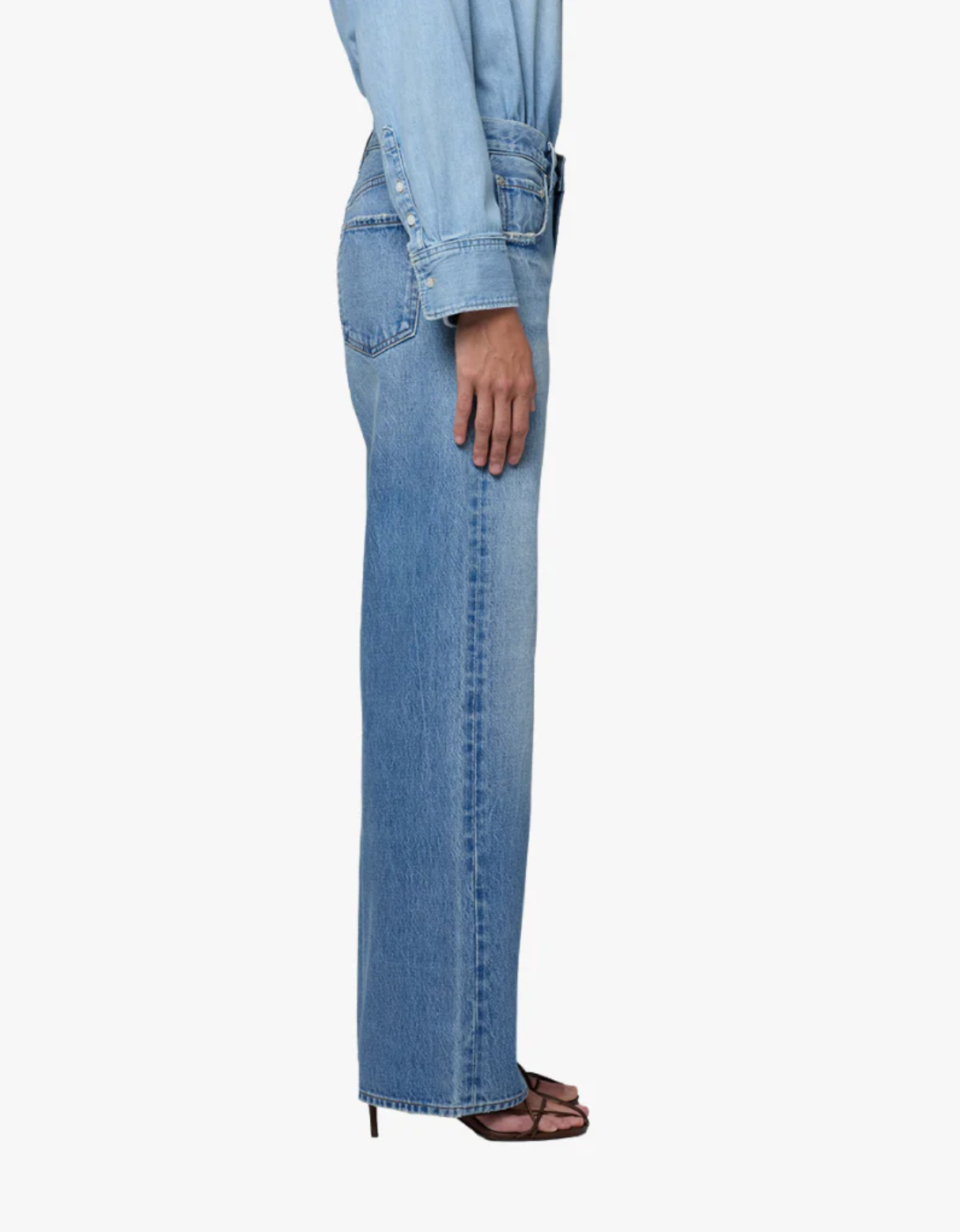 Side view of light wash denim Lindz Easy Straight Jean — Cupid by Citizens of Humanity styled with heeled sandals