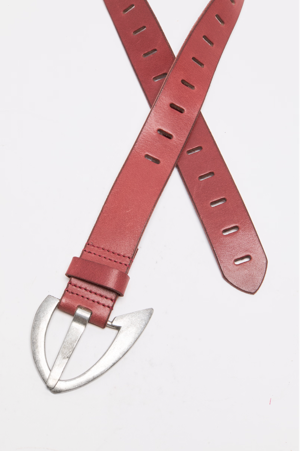 We The Free Noa Belt in Crimson with unique silver-toned buckle and adjustable holes in smooth leather design