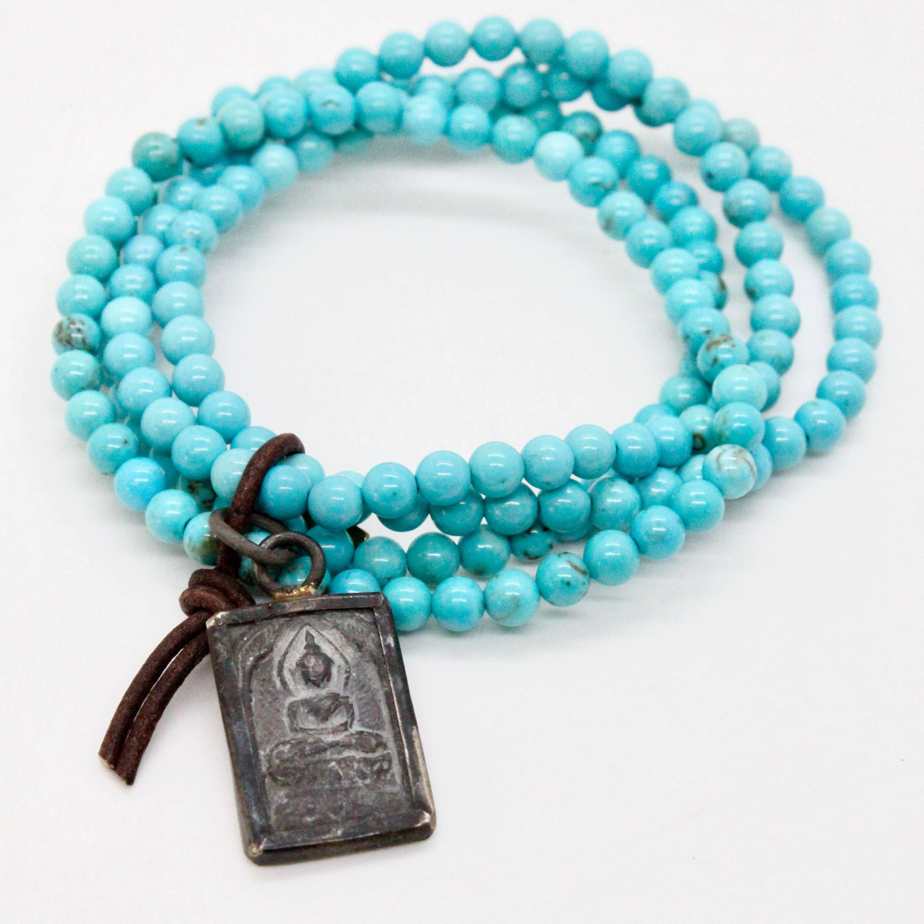 Turquoise and Small Buddha Charm Bracelet -Buddha Collection- with vibrant beads and a rustic Buddha pendant charm