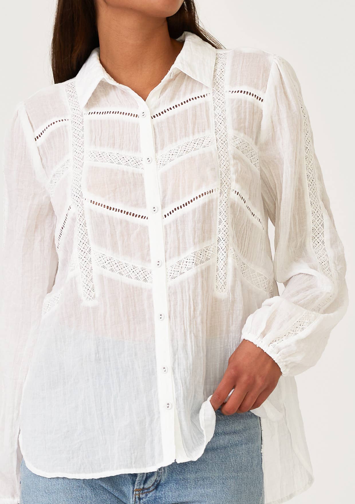 Crinkled Lace Long Sleeve Button Down Blouse in white with delicate lace inserts and textured fabric detail, styled casually.