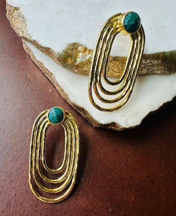 Jude Emerald Oval Earrings with layered gold oval hoops and deep green emerald stones