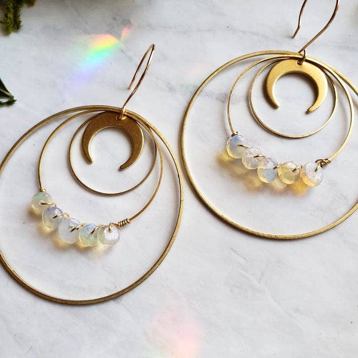 Opal Moon Halo Hoop Earrings featuring gold-toned crescent moons and iridescent opal beads on layered hoops.