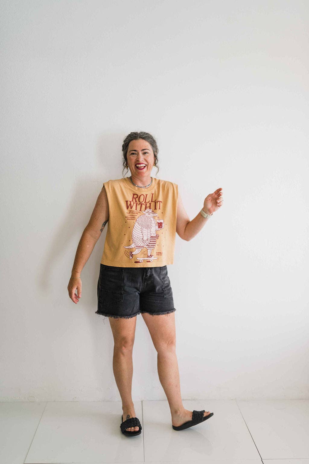 Roll with it armadillo | faded mustard boxy muscle tee