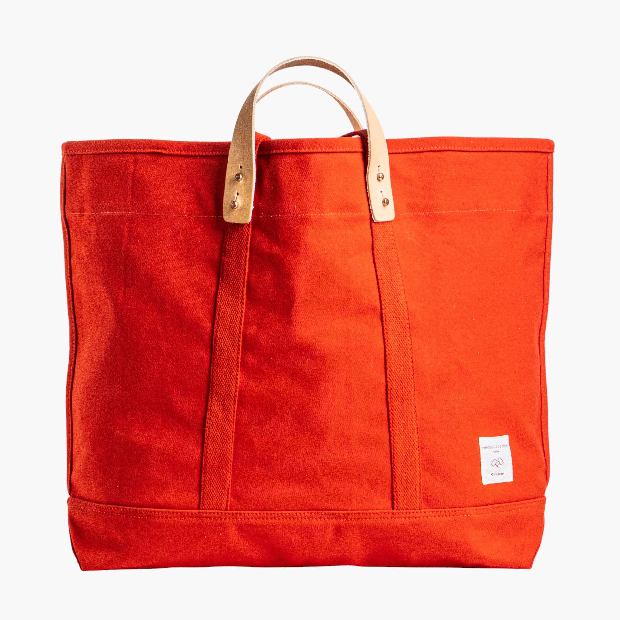 Large East West Tote | Persimmon with durable canvas body and leather handles for versatile everyday use and stylish appeal
