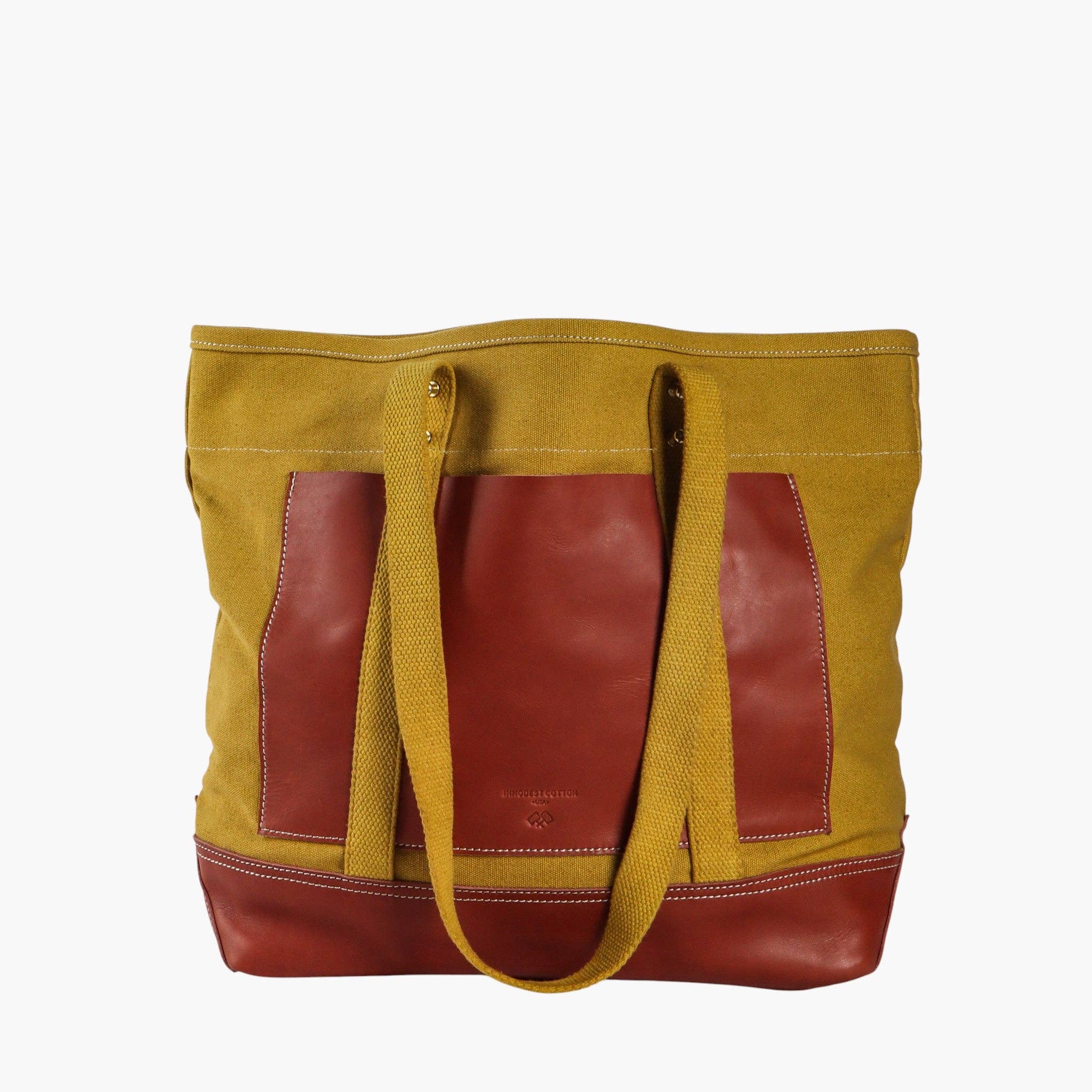 Editor Tote | Chartreuse + Bordeaux canvas bag with leather accents and dual handles for versatile everyday use