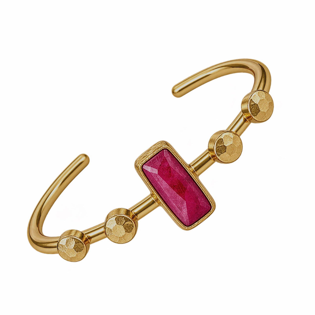 Harem Ruby Bangle with a gold tone finish and faceted red centerpiece