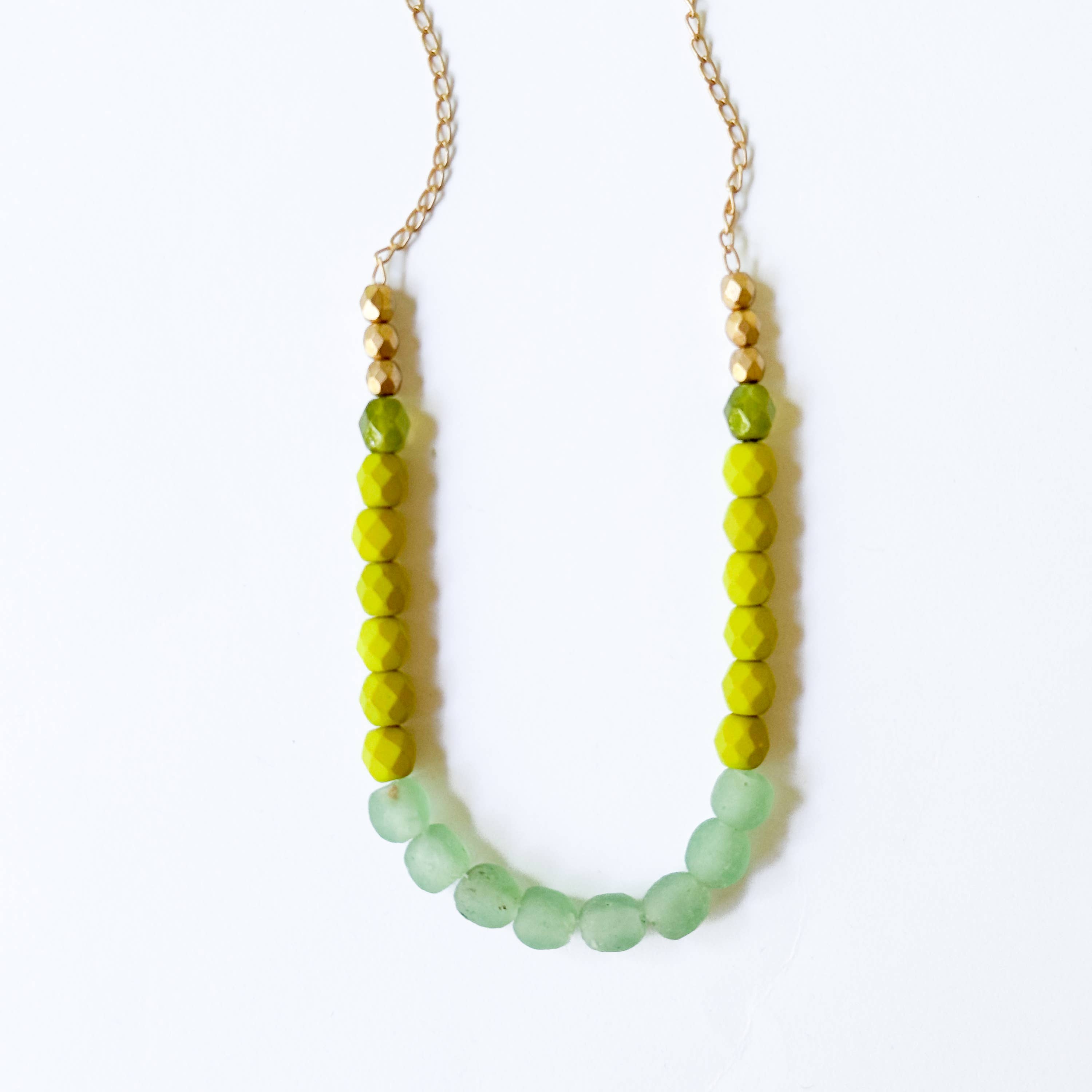 Multicolor Recycled African Glass And Mixed Bead Necklace with green and gold beads on gold chain handcrafted artisan jewelry